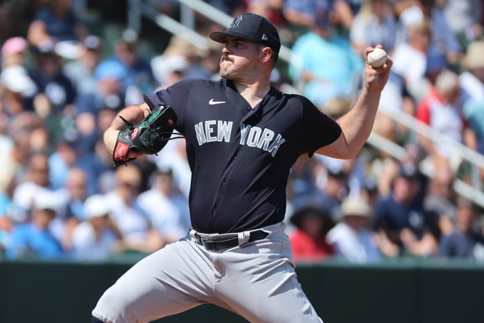 Yankees pitcher Carlos Rodon will start the season on the IL with a forearm strain.